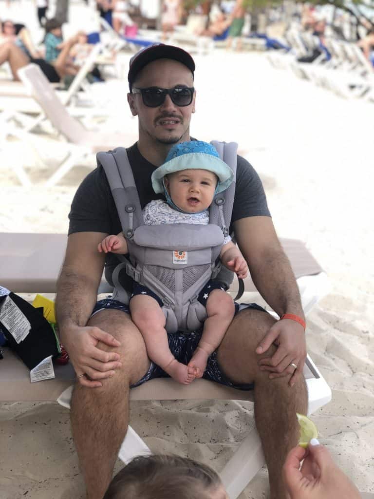 baby carrier at the beach