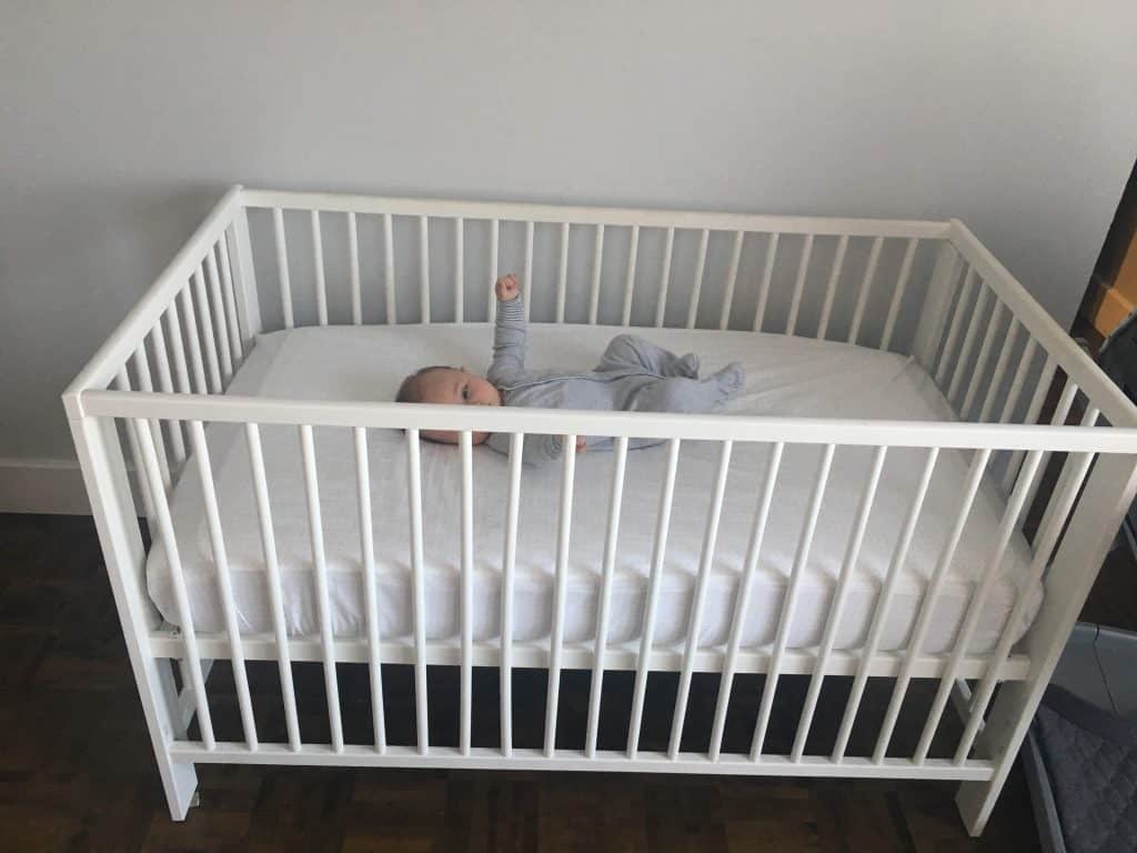 newborn sleep in a crib