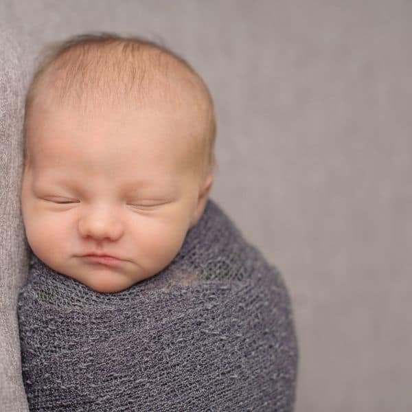 baby sleeping with swaddle