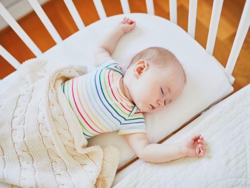 Baby sleeping in a cosleeper