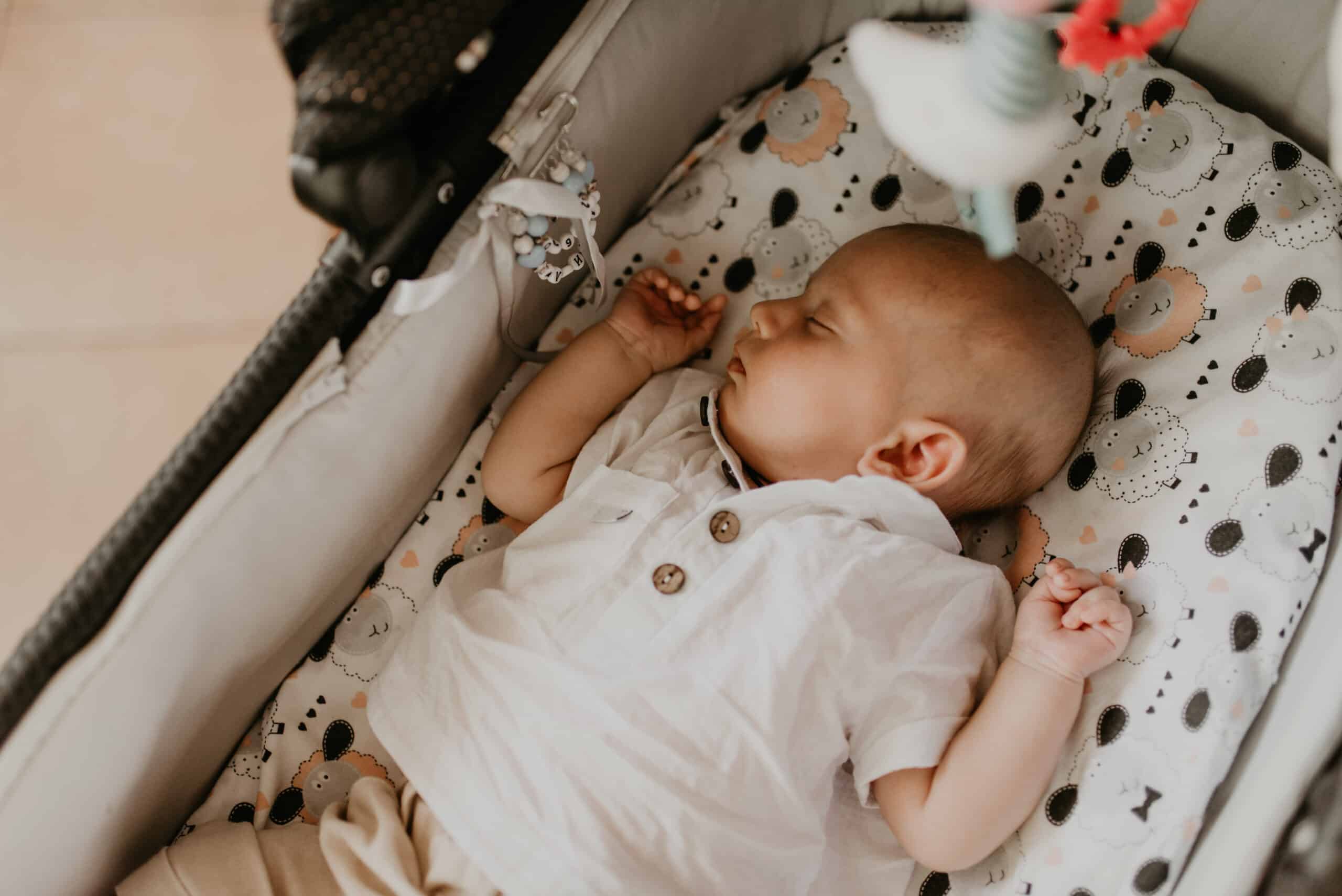 Baby sleeping in bassinet 